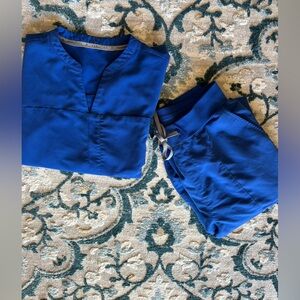 Fabletics blue scrub set XS top S bottom